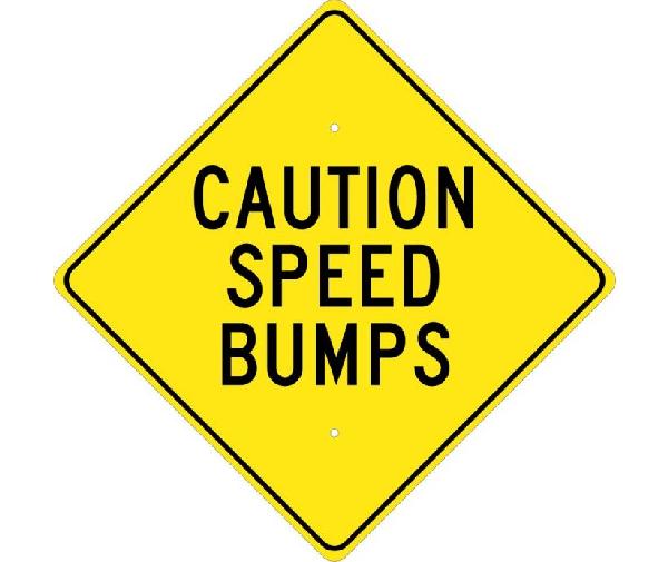 CAUTION SPEED BUMPS SIGN